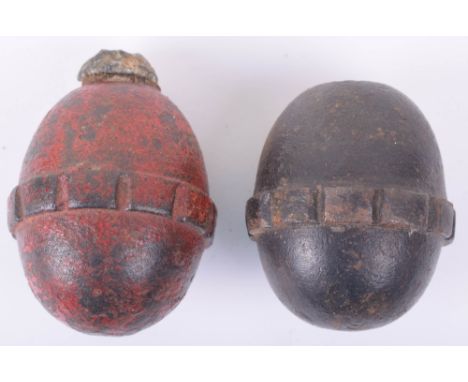 2x Inert German WW1 M.1917 Egg Grenades, one scarce a red-painted Training model.  Good condition overall. Please note this i