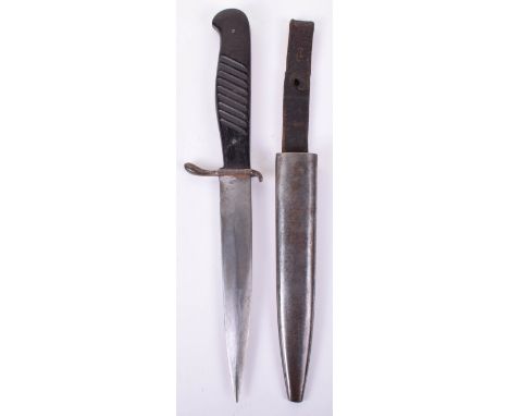 German WW1 Trench Dagger, with wooden grip and housed in its original scabbard with leather belt loop. 