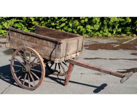 NOTTINGHAM.  A VICTORIAN OR EDWARDIAN BUILDER'S HANDCART, C1900 of wood and iron, the sides painted H WEIGHTMAN WILFORD, 107c