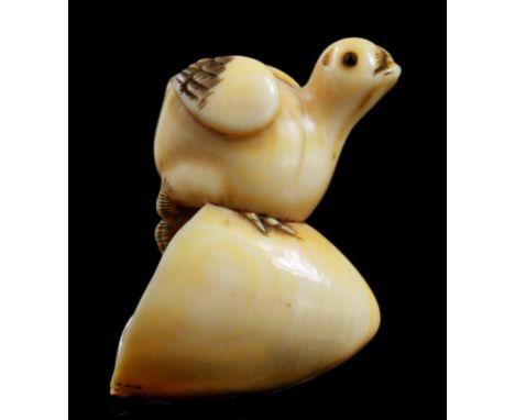 A JAPANESE IVORY NETSUKE OF A CHICK EMERGING FROM AN EGG, SIGNED DORAKU, OSAKA SCHOOL, EDO PERIOD, 19THE C the eyes inlaid, 4