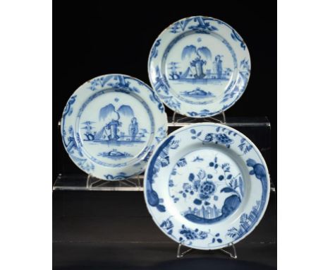 THREE ENGLISH DELFTWARE PLATES, ONE LONDON OR LIVERPOOL, C1750-60, TWO LONDON C1770-80 painted in cobalt with a Peony and Fen