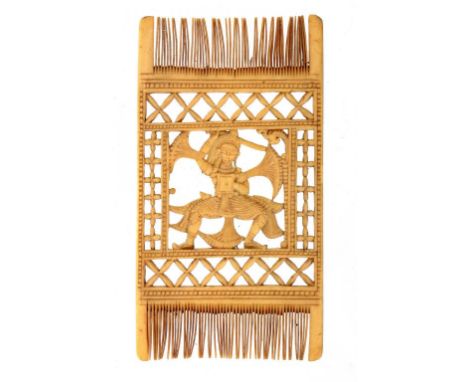 AN INDIAN CARVED BONE COMB, 18TH/19TH C 11cm h ++Small old loss to the left of the central figure