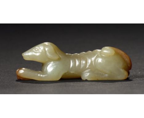 A CHINESE JADE CARVING OF A RECUMBENT DOG 4.9cm ++In good condition 