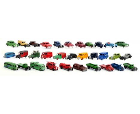 THIRTY TWO DINKY TOYS  comprising eight vans, five trucks, two tankers, three buses and fourteen cars ++Variable condition in