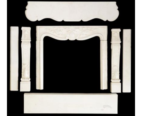 A MARBLE CHIMNEYPIECE, 20TH C with serpentine shelf, foliate carved scrolling apron and volute jambs, 126cm h approx; 149cm w