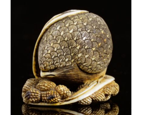 A JAPANESE IVORY NETSUKE OF A QUAIL ON MILLET, AFTER OKATOMO, KYOTO, EDO/MEIJI PERIOD, 19TH C  2.5cm h A closely similar exam