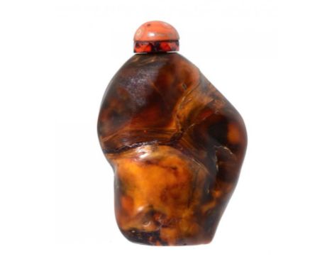 A CHINESE AMBER SNUFF BOTTLE 4.8cm excluding stopper ++Light wear/handling scratches consistent with being of some age.  In g