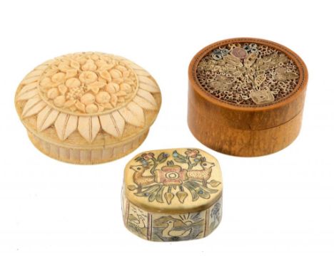 A CONTINENTAL TURNED AND CARVED IVORY BASKET SHAPED BOX AND COVER, EARLY 19TH C  7cm diam, a turned wood and quilled paper bo