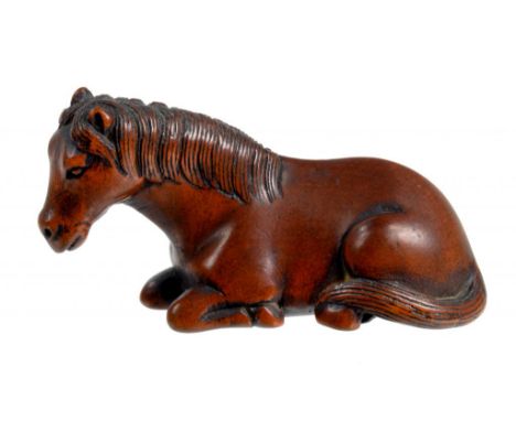 A JAPANESE BOXWOOD NETSUKE OF A RECUMBENT HORSE, EDO PERIOD, 18TH/19TH C  unsigned, 4.5cm l ++Good condition with fine natura