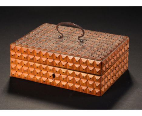 A PALAIS ROYAL NECESSAIRE, C1820  the softwood dog tooth carved box studded with brass pins, the fitted interior with mother 