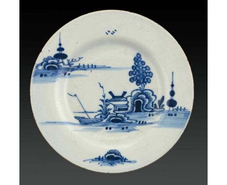 AN ENGLISH DELFTWARE PLATE, C1780 painted in cobalt with an island landscape, 23.5cm diam ++In good condition, no restoration