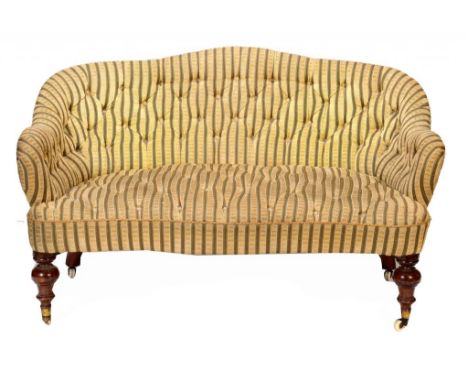 A VICTORIAN WALNUT SOFA, C1860  of serpentine form in buttoned upholstery, on turned forelegs with pottery castors, 78cm h, 1