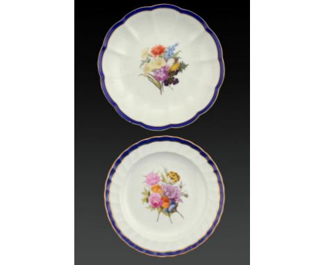A DERBY LOBED DISH AND MATCHING PLATE, C1795 painted with a central group of flowers in Smith's blue and gilt border, 22 & 21
