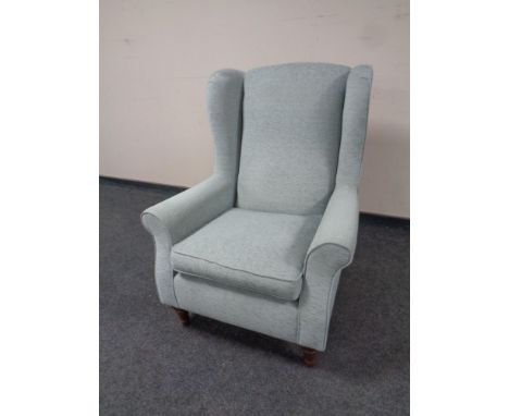A Marks and Spencer's wingback armchair, 100 cm high x 77 cm wide x approx. 85 cm deep. The seat height is 46 cm.    CONDITIO