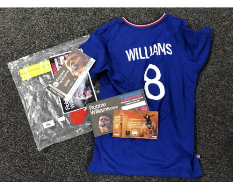 A Robbie Williams 'Sing When You're Winning' jersey together with a small quantity of ticket stubs 