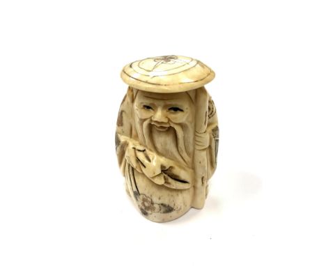 A Chinese bone netsuke - A Village Elder Wearing a Flat Hat. 