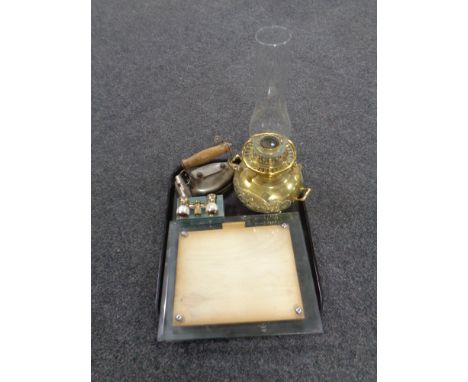 A tray containing pair of early 20th century glass picture frames, brass oil lamp, pair of opera glasses, Siemens iron  