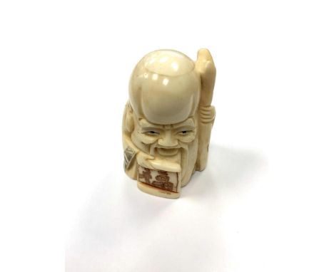 A Chinese bone netsuke - Village Elder with Stick. 