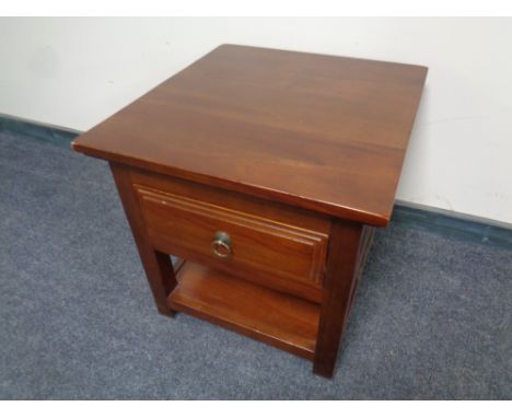 A contemporary lamp table fitted a drawer in a mahogany finish 