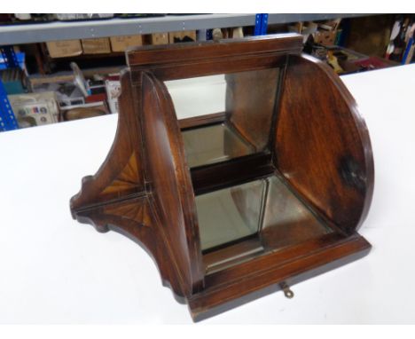 An Edwardian inlaid oak mirrored corner shelf 