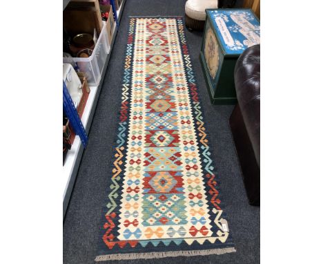 A Choli Kilim runner, 300 x 76 cm 