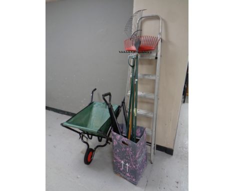 A folding aluminium stepladder together with a folding barrow and a quantity of garden tools  