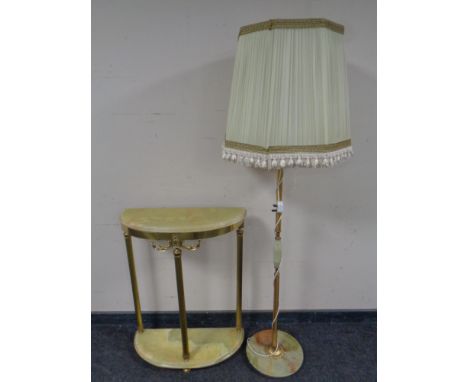 A brass and onyx two tier demi lune table together with a similar standard lamp with shade 