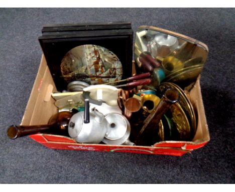 A box containing miscellaneous to include brass embossed plaques, a mid 20th century dressing table mirror, framed mirrored p