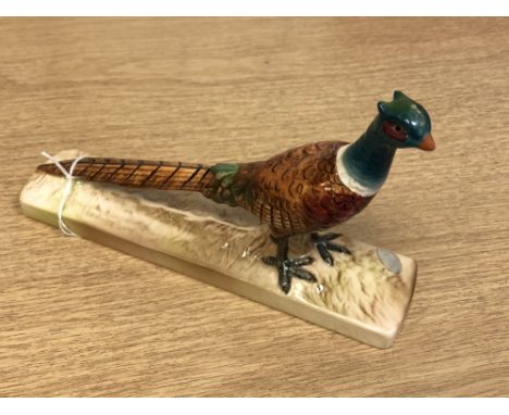 A Beswick china figure : Pheasant - On Pottery Base, model number 1774, gloss, with original Beswick sticker, length 22 cm, h