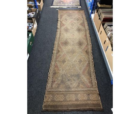 A Suzni kilim runner 257cm by 71cm