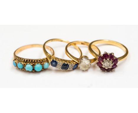 A collection of four 18ct gold rings (some stamped 18ct) to include a three stone sapphire and diamond ring , size Q1/2, a ru