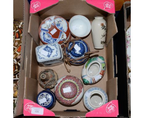 A group of Chinese and Japanese porcelain including Satsuma ware tea bowl and saucers, vases, ginger jar and cover with furth