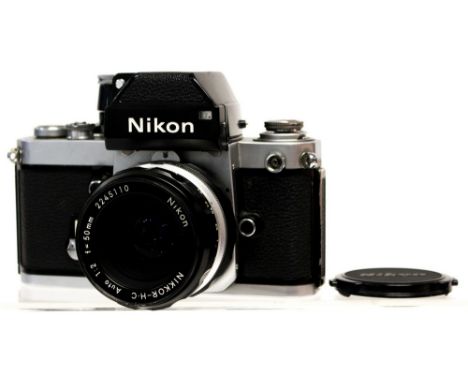 Nikon: A Nikon F2 SLR camera, serial number 8065640, appears in fair condition, shutter working, complete with lens, Nikkor-H