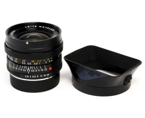 Leitz: A Leitz Wetzlar Elmarit-R, 1:2.8, 24mm, E60 lens, serial number 3209258, with lens hood, as found.