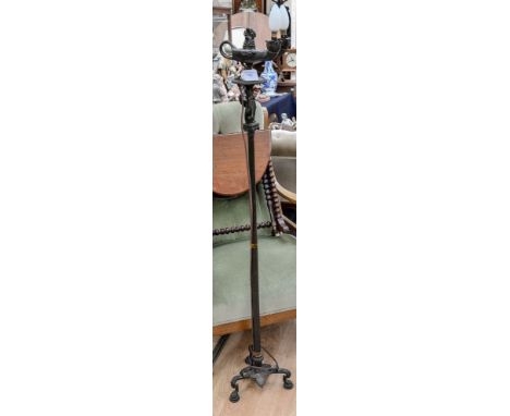 Regency style bronzed standard lamp on tripod legs, column stem, classical lamp top