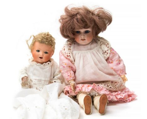 Armand Marseille: A pair of Armand Marseille dolls to comprise: a bisque head girl doll, with inscription to the back of the 