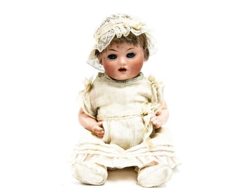 Bahr & Proschild: An early 20th century Bahr & Proschild bisque head doll, open mouth, revealing two top teeth, eyes open and