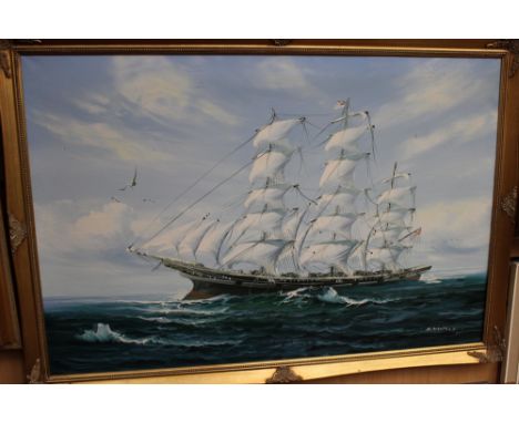 K Maskell, oil on canvas depicting a sailing boat in stormy seas, signed to lower right, fitted in a gilt frame