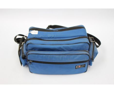 A Nikon camera with two lenses and other attachments in carry case 