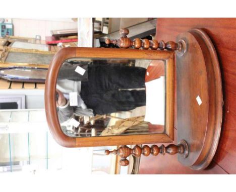 A mahogany dressing table mirror, having carved 'bobbin' style supports 