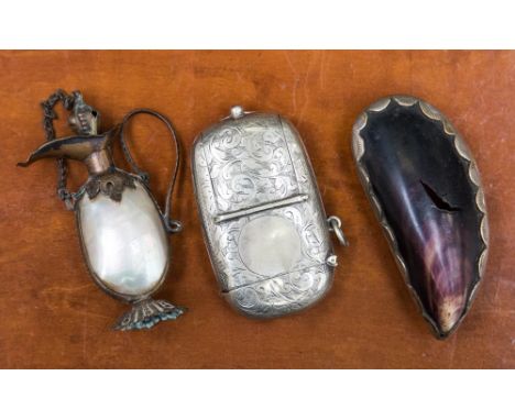 A white metal combination Sovereign and vesta case; together with mother of pearl ewer scent bottle and mussel shell snuff bo