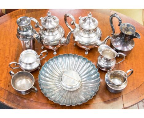 An Elkington silver plated fluted bowl, ref: 38385, with James Dickson three piece tea service EPNS cocktail shaker and a fur