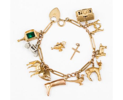 A 9ct gold charm bracelet with eleven gold charms, (two loose) including a horse, riding boot and lantern etc along with a si