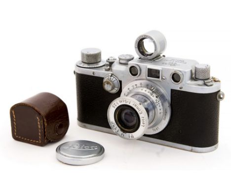 Leica: A Leica IIIc, dating 1946/47, camera body Serial No. 402965, complete with lens - Leitz Elmar f=5cm, 1:3.5, with lens 