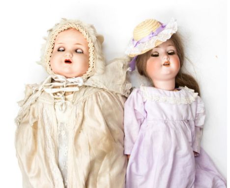 Armand Marseille: A pair of Armand Marseille bisque head dolls, one inscribed to the back of the head 'A.M. Germany 551./5.',