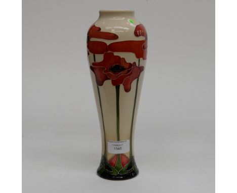 A Moorcroft vase in the Blue Heaven pattern, 1st quality, in unusual colourway, having red flowers on cream ground, designed 