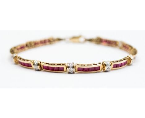A 10k ruby bracelet, with ten links each channel set with four square cut rubies, with alternate diamond set spacers, with a 