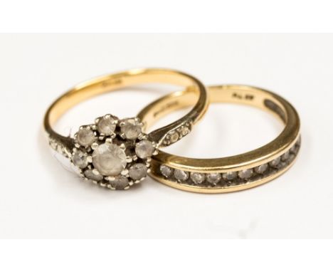 A 9ct gold  and diamond half eternity ring, set with eleven diamond chips, approx size K½, together with an 18ct gold,  flowe