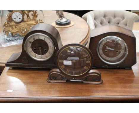 Three various mantle clocks, comprising two eight day mantle clocks and a windup clock, all dating to the first half of the 2
