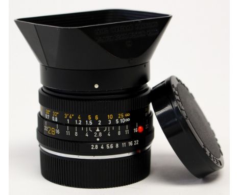 Leitz: A Leitz Elmarit-R, 1:2.8, 28mm lens, serial number 3314073, with lens hood and cap, as found.